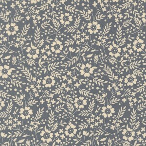 May include: A seamless fabric pattern featuring a dense arrangement of cream-colored floral and leaf motifs against a muted blue-gray background. The design includes various sizes of flowers, leaves, and small berry-like details, creating a delicate, all-over print.