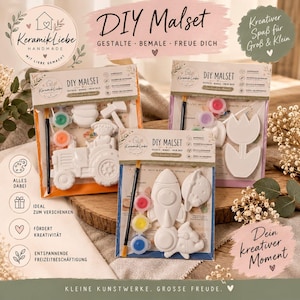 Può includere: Tre kit per dipingere fai-da-te etichettati DIY Malset, ciascuno contenente forme in ceramica bianca, un pennello e piccoli vasetti di vernice. I set presentano disegni di trattore, razzo e tulipano, con testo sulla confezione KeramikLiebe.