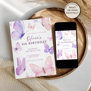 May include: A birthday invitation with watercolor butterflies in shades of purple and pink. The invitation reads "Olivia's 4th Birthday" with event details. A smartphone displays the same design. The invitation is on a wooden tray.