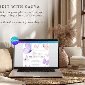 May include: A laptop displays a birthday invitation with butterfly graphics. The invitation reads "Olivia's 4th Birthday" with the date and time. The laptop is on a woven mat, with a vase of dried flowers and a stack of books in the background. The text "Edit with Canva" is at the top.