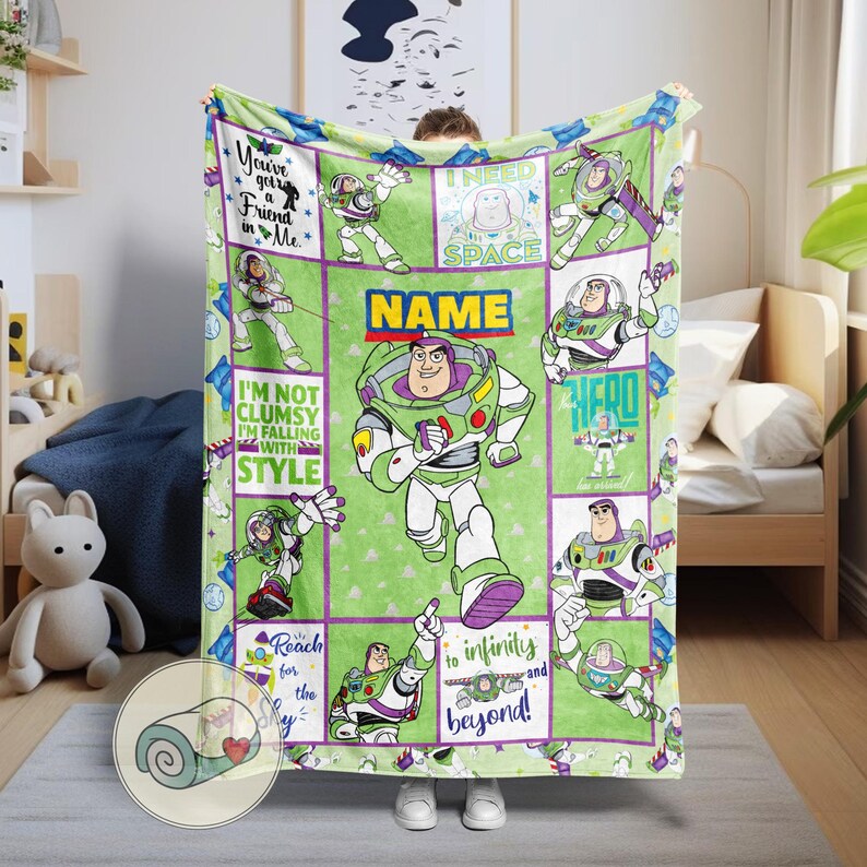 May include: A green and purple Buzz Lightyear blanket featuring the character in various poses. The blanket has a grid design with phrases like "I need space" and "to infinity and beyond!" The blanket is made of soft material.