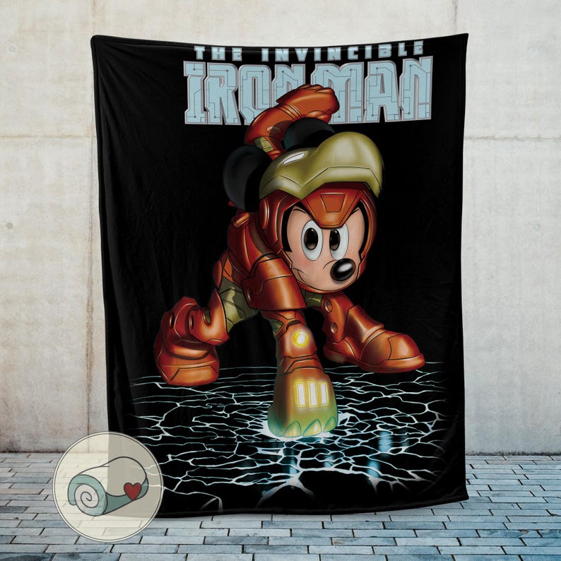 May include: Black blanket featuring Mickey Mouse in an Iron Man suit, with the text "THE INVINCIBLE IRON MAN" in blue and white. The blanket has a cracked ground design and a cartoon style.