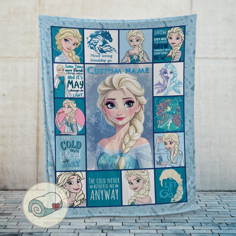 May include: A light blue fleece blanket featuring Elsa from Frozen. The blanket has a central image of Elsa surrounded by smaller images and quotes from the movie. The words "CUSTOM NAME" are also visible.