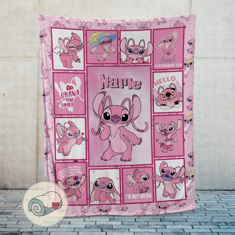 May include: Pink fleece blanket featuring a repeating pattern of the character Angel from Lilo & Stitch. The blanket has a central panel with the name "Name" and various Angel illustrations. The words "OHANA MEANS FAMILY", "Angel EXPERIMENT 624", and "I'M NOT WEIRD" are also visible.