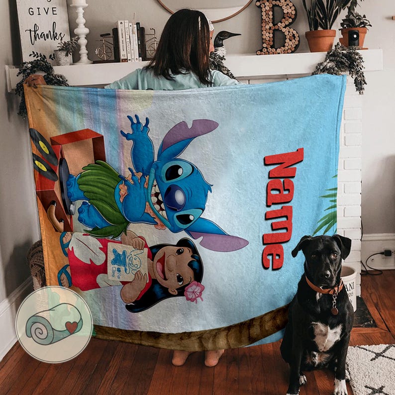 May include: A blue and white blanket featuring the characters Stitch and Lilo from the Disney movie Lilo & Stitch. The blanket has a personalized name in red and a tropical theme.