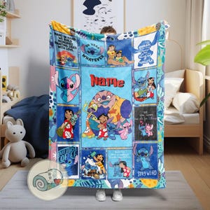 May include: A colorful blanket featuring various images of the character Stitch from the Disney movie Lilo & Stitch. The blanket has a blue background with multiple panels, each showcasing Stitch in different poses and scenes. The blanket also has the text "Name", "Oh Yeah Whatever", and "Stay Weird".