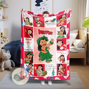 May include: A red fleece blanket featuring a collage of cartoon images of a girl in a green skirt and a red top. The blanket has the text "Name", "Ohana Family Family Forgotten", and "I can't adult today".