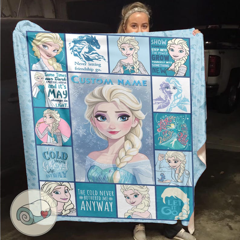 May include: A light blue fleece blanket featuring Elsa from Frozen. The blanket has a central image of Elsa surrounded by smaller images and quotes from the movie. The words "CUSTOM NAME" are also visible.