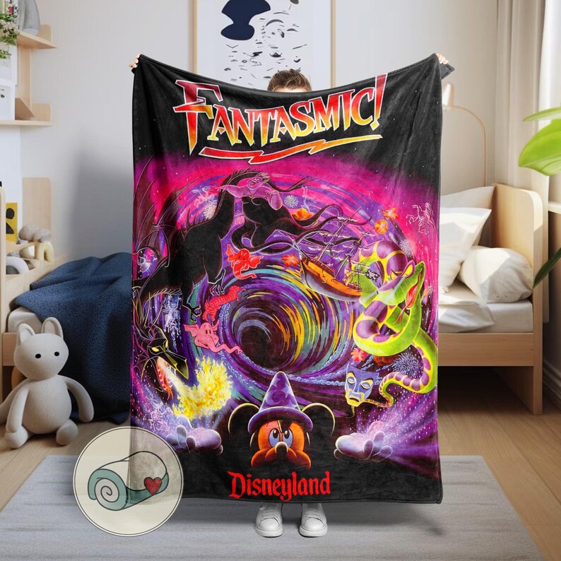 May include: Black blanket featuring the word "FANTASMIC!" in red and yellow, with a vibrant, swirling design of dragons, Mickey Mouse in a wizard hat, and other characters. The word "Disneyland" is printed in red at the bottom.