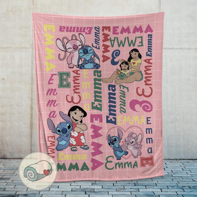 May include: Pink blanket featuring cartoon characters and the name "Emma" in various fonts and colors. The blanket has a grid pattern and includes images of Stitch and Angel. A rolled-up blanket with a heart is in the corner.