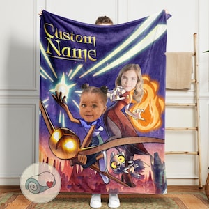 May include: A custom fleece blanket featuring a cartoon design with two faces and the text "Custom Name" in gold. The blanket has a purple background with a cartoon illustration of a flying creature and a castle.
