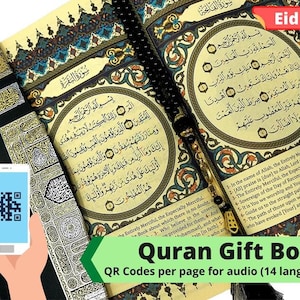 May include: An open Quran with Arabic text and a black beaded rosary. A smartphone displays a QR code. The words "Quran Gift Box" and "Eid Gift" are visible. The Quran has decorative borders and gold accents.
