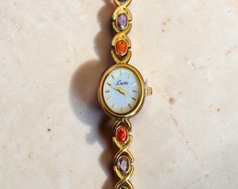 Orologio da polso vintage da donna, con bracciale e cristalli multicolore color oro.
