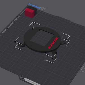 May include: A black circular 3D printed component featuring a square centre cutout and two side mounting tabs. The text "CIVIC" is printed in red on the top surface. The object is displayed on a digital grid interface labelled Double Sided PEI Sheet.