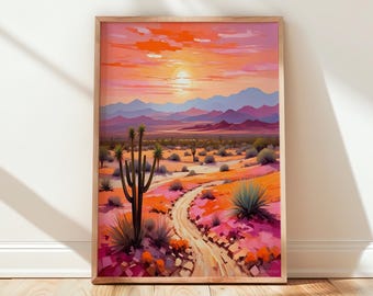 Könnte beinhalten: Ein gerahmter vertikaler Wandkunstdruck, der eine Wüstenlandschaft bei Sonnenuntergang zeigt. Die Szene umfasst einen gewundenen Feldweg, hohe Saguaro-Kakteen und niedrige Wüstenvegetation unter einem leuchtenden Himmel in Orange-, Rosa- und Violetttönen.