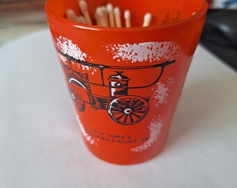 Gay Fad Studio rocks glass, fire engines, repurposed as match holder with striker