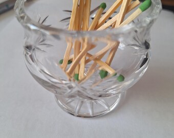 Cut crystal footed dish repurposed into match holder