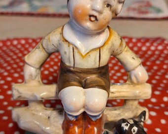 vintage figurine boy on fence, red boots,scottie dog Japan