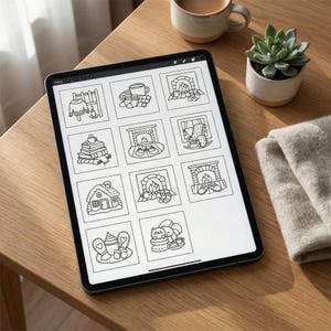 May include: A digital tablet shows a grid of black and white line art illustrations with a cosy theme. The drawings include a fireplace, a stack of books, a house, and a cat. The tablet is on a wooden table, with a cup of coffee, a succulent, and a folded blanket.