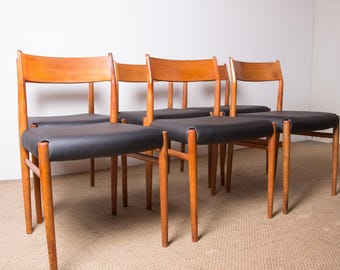 Conjunto de 6 cadeiras dinamarquesas em teca e skai, novas, modelo 418 de Arne Vodder para Sibast, 1960.