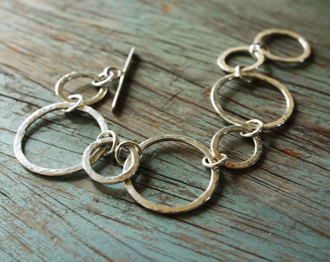 hammered sterling silver bracelet with small and large circles, ildiko jewelry, minimalist jewelry