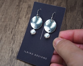 white freshwater coin pearl dropped off hammered sterling silver circular discs, dangly earrings, ildiko jewelry, minimalist jewelry