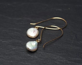 white freshwater coin pearl drops off sleek long gold hooks dangly earrings, ildiko jewelry, minimalist jewelry