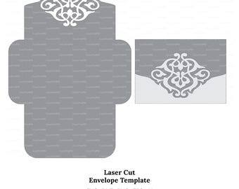 Puede incluir: Una plantilla de sobre gris cortada con láser con un diseño de filigrana blanco decorativo. El diseño se repite en una tarjeta separada. El texto "Laser Cut Envelope Template" está debajo, junto con las opciones de tipo de archivo.