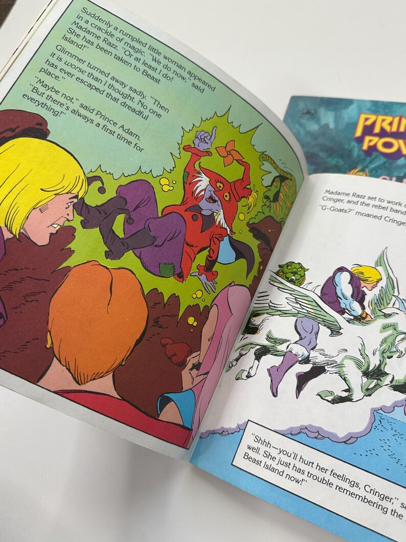 May include: Comic book pages with colorful illustrations. One page shows a scene with characters in red, purple, and green. Text bubbles contain dialogue. Another page features a winged character and text. The comic book is titled "PRIN POV".