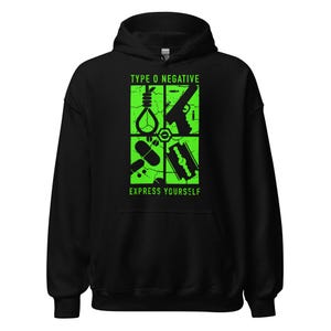 May include: Black hooded sweatshirt with a neon green graphic. The graphic features four squares with images of a noose, a gun, a pill, and a razor blade. The text "TYPE O NEGATIVE" and "EXPRESS YOURSELF" are in neon green.