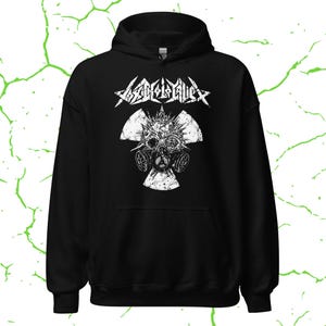 May include: Black hooded sweatshirt with a white graphic. The graphic features a skull wearing a gas mask, set against a radiation symbol. The word "APOCALYPSE" is written above the skull in a stylized font.