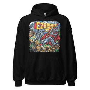 May include: Black hooded sweatshirt featuring a colorful comic book-style graphic with the text "EZARFACE." The graphic depicts a battle scene with various characters and an elephant. The sweatshirt has a drawstring hood and a kangaroo pocket.
