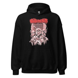 May include: Black hooded sweatshirt featuring a red graphic of skeletal figures with swords and the word "ENTOMBED" in a stylized font. The design includes skulls and a gate-like structure, creating a dark, gothic aesthetic.