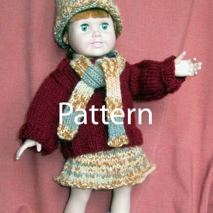 May include: A doll wearing a burgundy knitted sweater, a striped scarf, and a brown and beige knitted skirt. The doll is also wearing a brown and beige knitted hat with a pom-pom on top. The doll is wearing beige boots with white fur trim. The doll is standing on a red surface. "Pattern" is written in white text on the image.