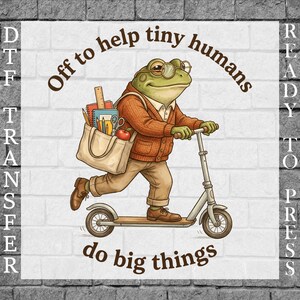 May include: A graphic illustration of a green frog wearing round glasses, a brown cardigan, and tan trousers, riding a silver scooter. The frog carries a beige tote bag filled with school supplies. Text reads: Off to help tiny humans do big things.