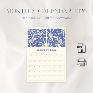 May include: A printable PDF monthly calendar for January 2026. The calendar has a cream background with a blue floral design at the top. The text "MONTHLY CALENDAR 2026" is at the top, with "PRINTABLE PDF | INSTANT DOWNLOAD" below.