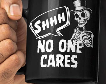 Shhh No One Cares Skeleton Mug | Black Ceramic Coffee Cup