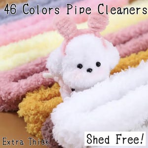 May include: A selection of 46 Colors Pipe Cleaners in pastel hues, such as pink, yellow, and purple. The image includes the text "Extra Thick" and "Shed Free!". A white plush toy with a pink headband is in the foreground.