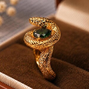 Slangenring van verguld koper of antiek zilver · Groene zirkonia · Open ring, verstelbaar · Vintage stijl