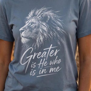 Greater Is He Who Is In Me Christian T-Shirt, Lion of Judah Faith Scripture Apparel, Inspirational Religious Gift for Her Him