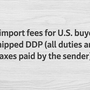 May include: A set of three ceramic mugs with a speckled, matte finish. The mugs are in shades of cream, light gray, and dark gray. Each mug has a simple, minimalist design, perfect for coffee or tea.