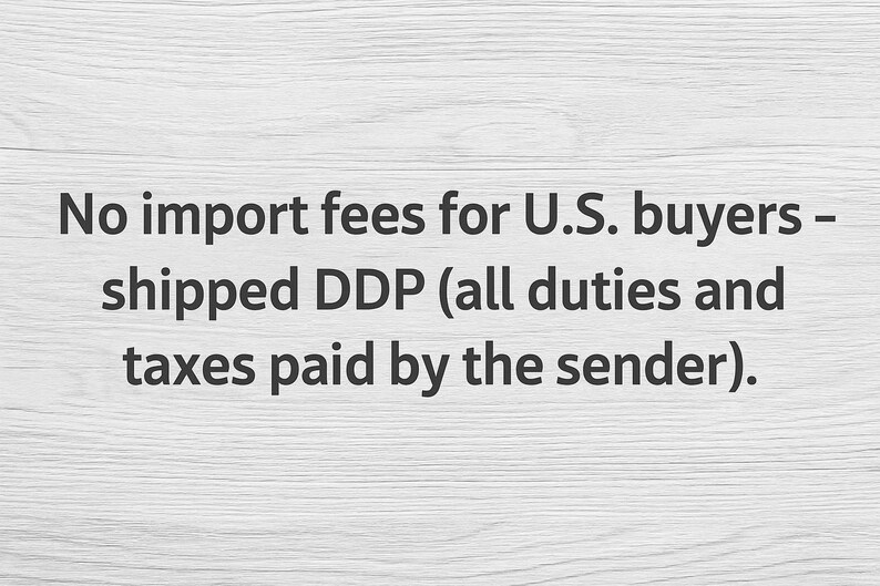 May include: A set of three ceramic mugs with a speckled, matte finish. The mugs are in shades of cream, light gray, and dark gray. Each mug has a simple, minimalist design, perfect for coffee or tea.