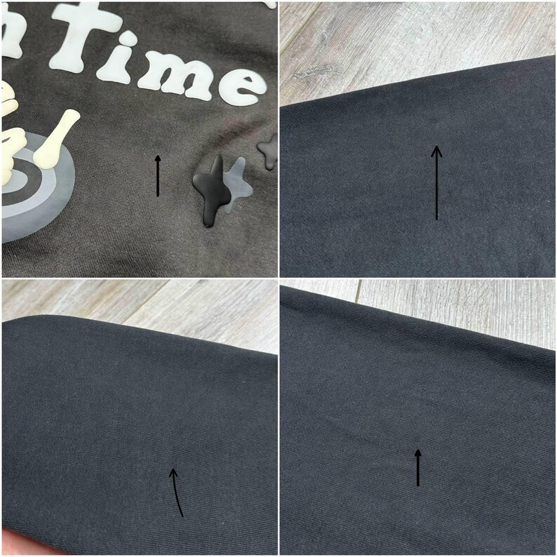 Może przedstawiać: Zbliżenie na ciemnoszarą koszulkę z napisem "Time" w białym, stylizowanym tekście. Koszulka ma graficzny wz&oacute;r z celem i kształtami przypominającymi kości. Tkanina wydaje się miękka i lekko teksturowana.