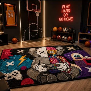 May include: A rectangular area rug featuring a split-design character holding a game controller. One side shows a gray skeletal figure with an X-eye, while the other reveals a colorful anatomical brain and internal structure. Includes lightning and X motifs.