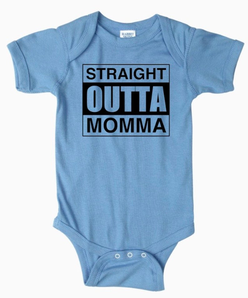 May include: A light blue baby onesie with a black graphic that says "STRAIGHT OUTTA MOMMA".