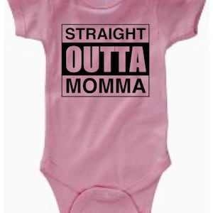 May include: Pink baby onesie with black text that reads "STRAIGHT OUTTA MOMMA".