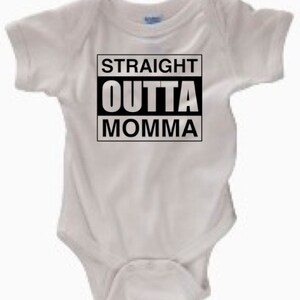 May include: White baby onesie with black text that reads "STRAIGHT OUTTA MOMMA".