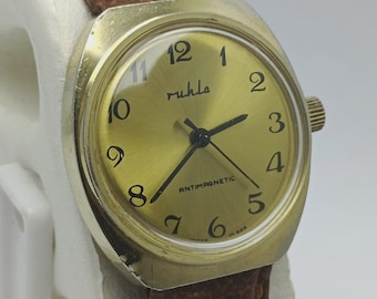 Reloj Ruhla Vintages para hombre con esfera dorada y cuerda manual ALM313AR5