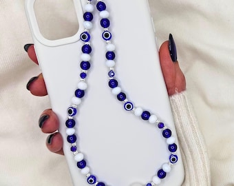 Correa para teléfono con dije de ojo turco azul, correa de muñeca con cuentas, dije protector para teléfono, detalle de perlas, lindo regalo estético para ella.