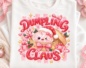 May include: A white sweatshirt featuring a graphic of a winking dumpling wearing a Santa hat inside a bamboo steamer. The text reads DUMPLING CLAUS in red glittery letters, surrounded by pink bows, candy canes, and gift boxes.